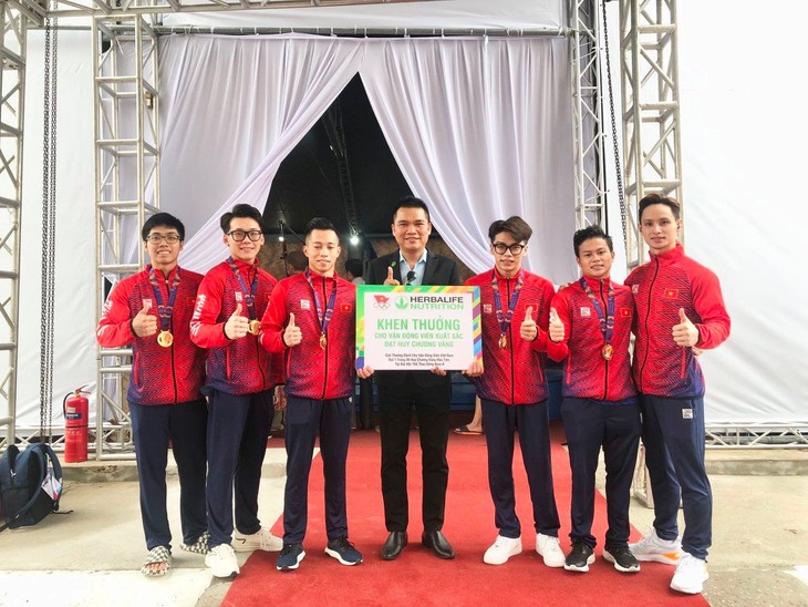 Herbalife Việt Nam thưởng nóng cho 30 Huy Chương Vàng đầu tiên của Đoàn Thể Thao Việt Nam tại SEA Games 31 ảnh 1 the-duc-dung-cu-dong-doi-nam.jpg