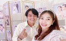 Vợ chồng Cao Minh Đạt tình tứ khi dự đám cưới Hồ Bích Trâm